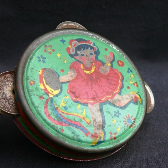 Fun colorful tambourine. Vintage collectible toy.