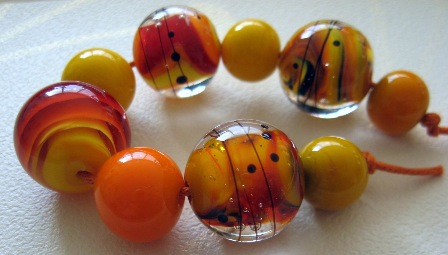 Reserved for Sandra - Feel the Sun - Handmade Lampwork Bead Set (9) by Anne Schelling, SRA