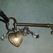 Vintage skeleton key with heart locket, crystals and tiny rose