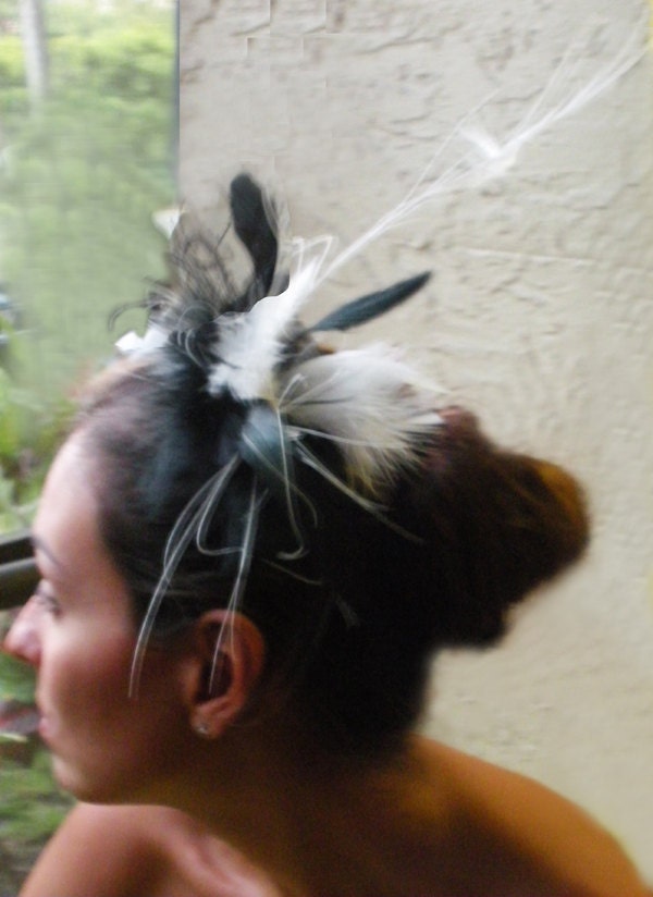 Black and White feather fascinator with white peacock