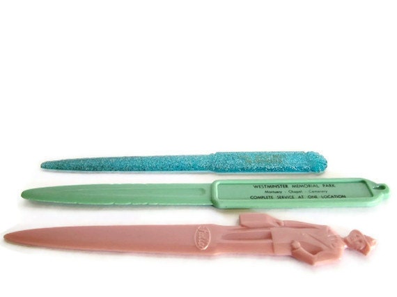 Vintage Letter Openers Including a Pink Fuller Brush Man