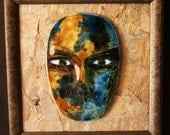 Hand painted kiln fired glass face.  The Face of Nature