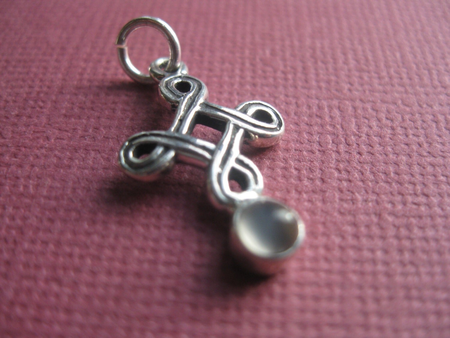 Celtic Cross Sterling silver with magical moonstone on the bottom.