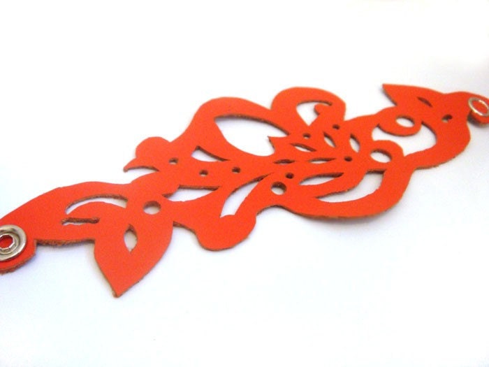 Bright orange hand cut leather cuff