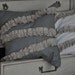 gray ruffled pillow cover