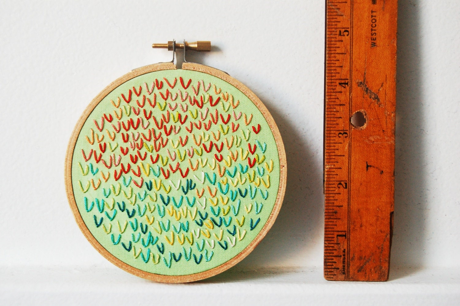 Hoop Wall Art. Hand Embroidered Wishbone Circle in 4 inch Hoop. Mint, Red, Blue, Aqua. By merriweathercouncil on Etsy