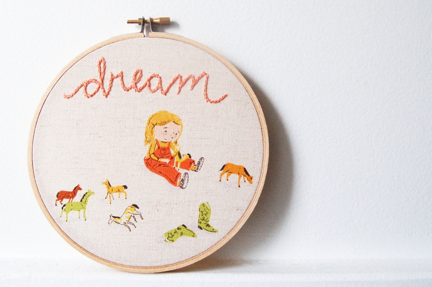 Hand Embroidered Hoop Wall Art. Dream. Little Girl Playing with Horses. Shades of Orange on Linen. by merriweathercouncil on Etsy.