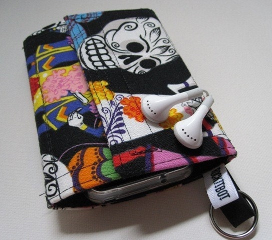 Nerd Herder odds and ends gadget wallet in Day of the Dead- iPod, Droid, Zune, MP3, metronome, digital camera, earbuds, SD cards, USB, extra batteries, guitar picks, IDs, credit cards, phone- one wallet holds whatever you want to round up.