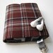 Nerd Herder gadget wallet in Perfect Plaid for iPod, Droid, iPhone, camera, earbuds, SD cards, USB, batteries, guitar picks, IDs, cards