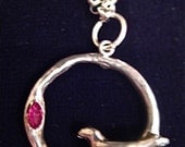 Bird in the hand Pendant with ruby