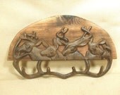 Rustic Deer coat rack  -- lodge cabin decor -- rich patina on cast iron hooks and western cedar