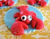 12 fondant lobster toppers