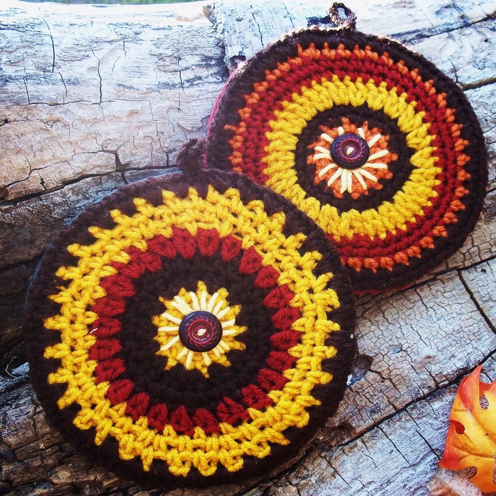 set of two crocheted potholders in fall colors
