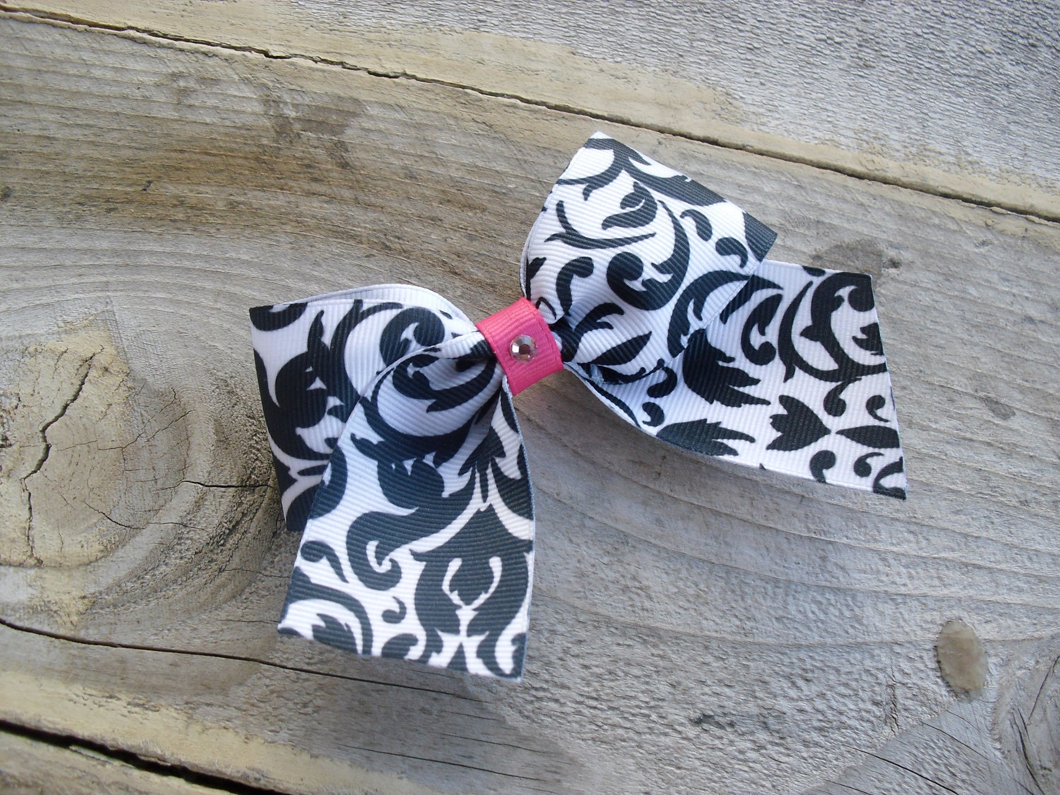 Black and White Paisley Bow with hot pink center and swarovski crystal