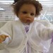 Childs white sweater/cardigan.18/20ins chest..Unisex. ClassicVneck style.