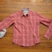 women's Barbour plaid button up shirt.
