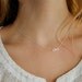 Tiny Diamond Infinity Bow Necklace