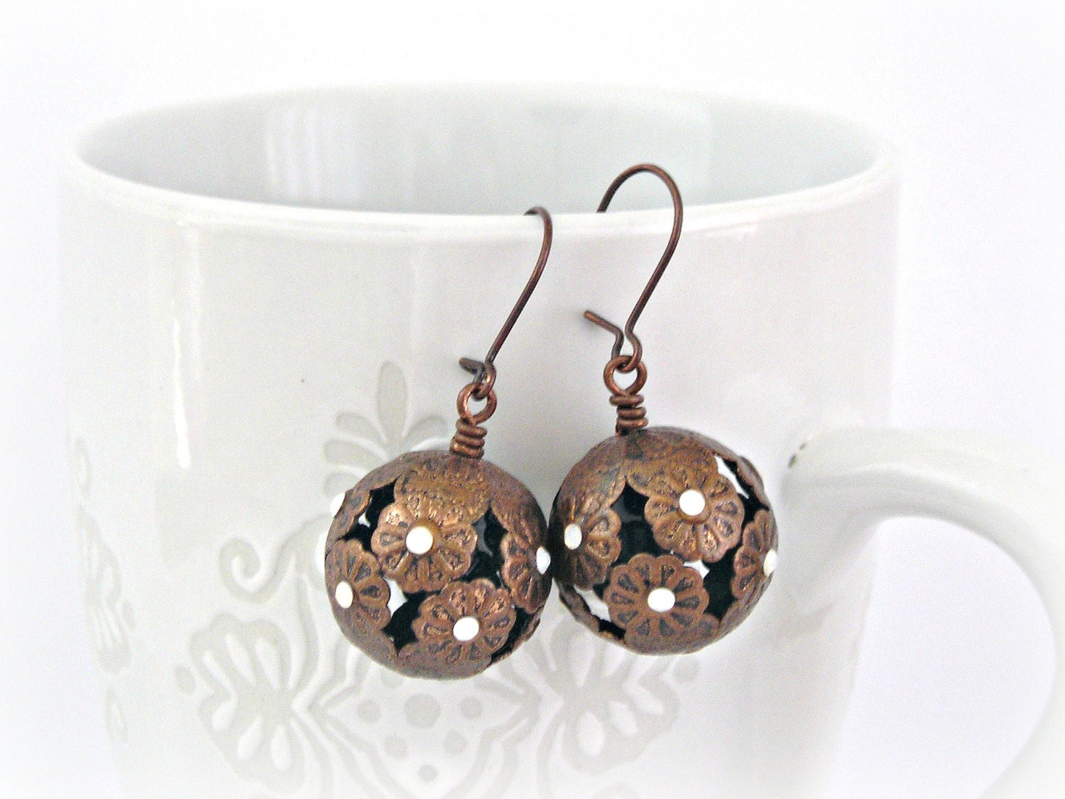 White opal sparkles in copper flowers earrings