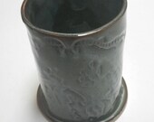 Crock for spoons in blue with textures