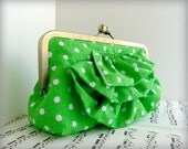 Bright green clutch purse in frame, ruffle clutch bag, polka dot fashion