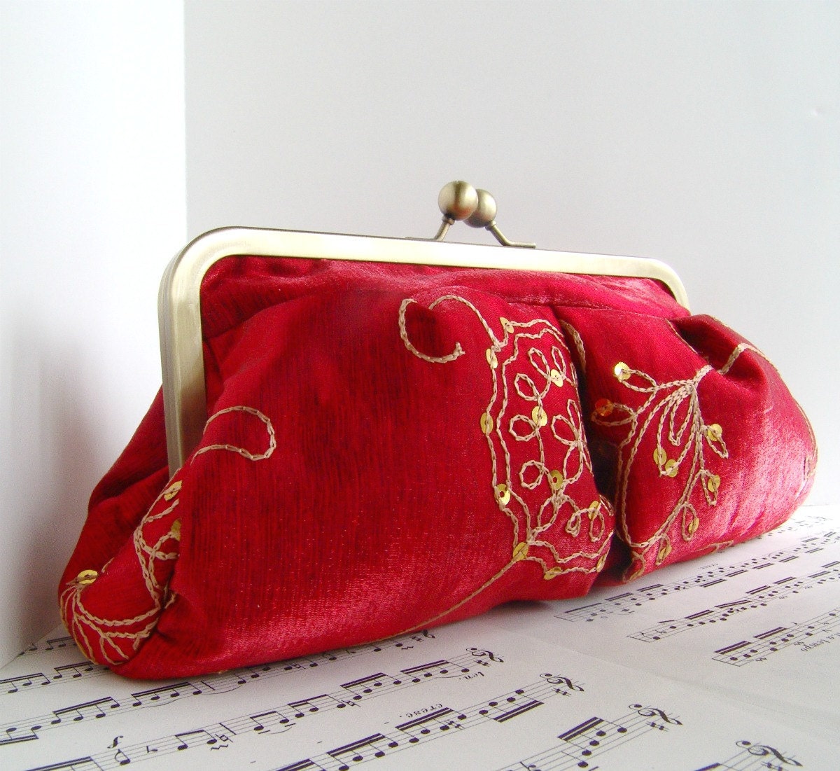 Bright red clutch purse evening bag with gold embroidery and sequins