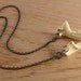 jaw bone necklace - mink jaw on gunmetal