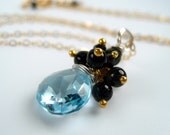 Sky Blue Topaz Necklace with Black Tourmaline, Gold and Silver by dirty rice on etsy