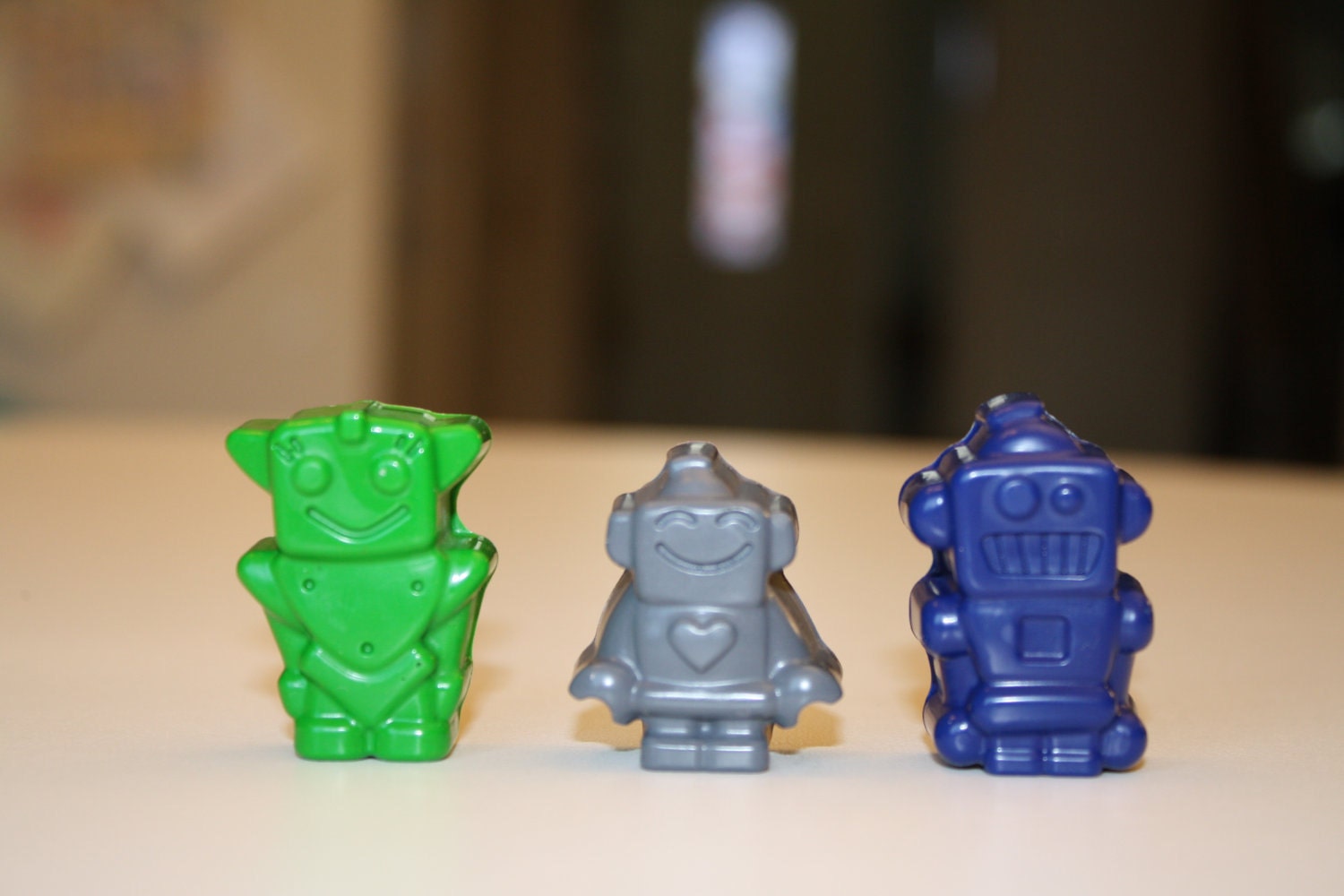 10 set of 3 robot crayons in cello bag tied with ribbon