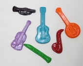 12 music instrument crayons - in cello bag tied with ribbon