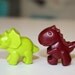 15 set of 4 Dino crayons - assorted colors - in cello bag with ribbon