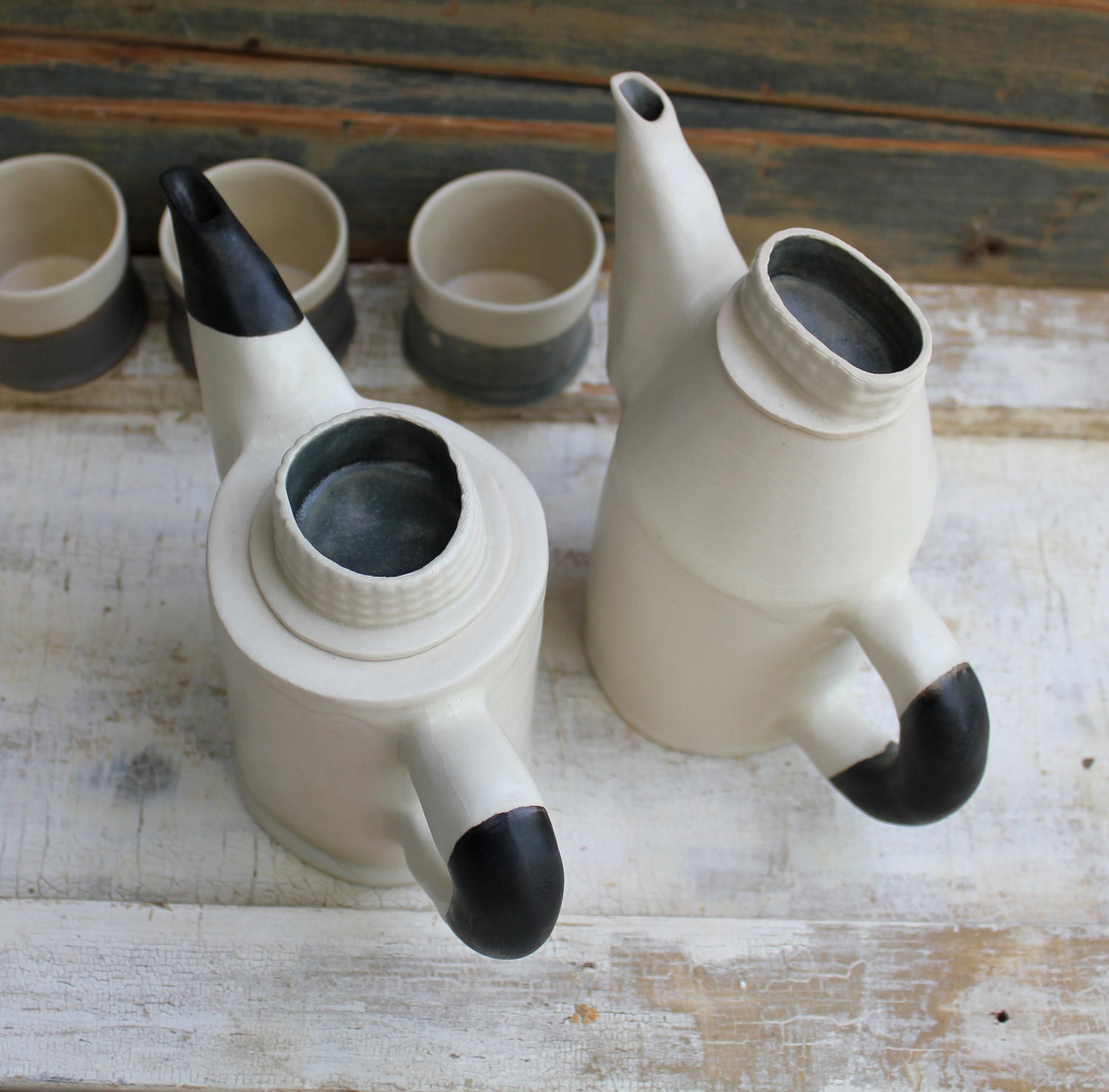 little porcelain black and white teapots for a lovely tea break - lauriegceramics