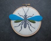 Wasp - hand embroidered in 4 inch hoop.  Aqua, Green & Charcoal Gray