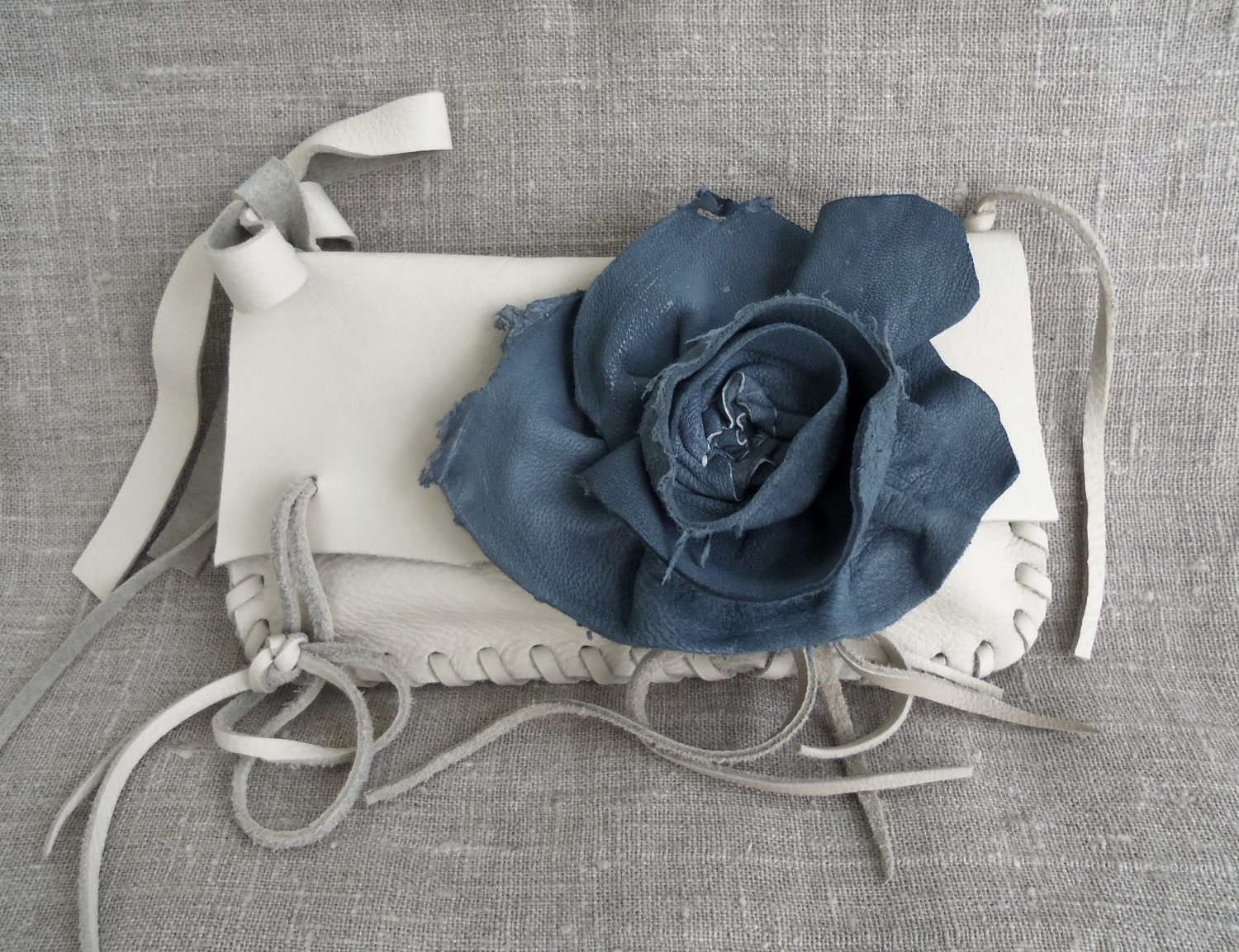 creamy white leather clutch or wristlet with denim blue rose flower by Tuscada. Ready to ship - tuscada