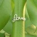 Silver wire LOVE ring