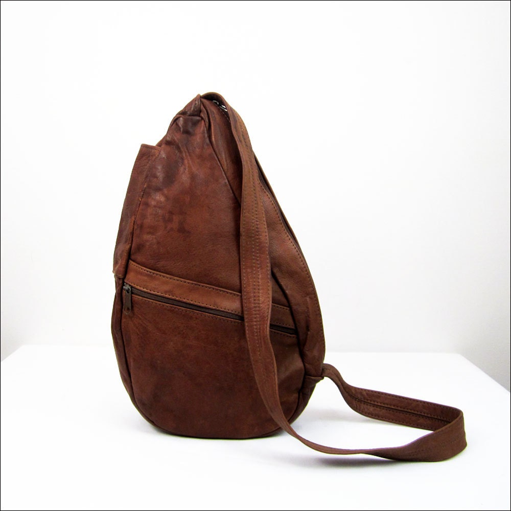 brown saddle leather teardrop backpack / sling by OmniaVTG on Etsy