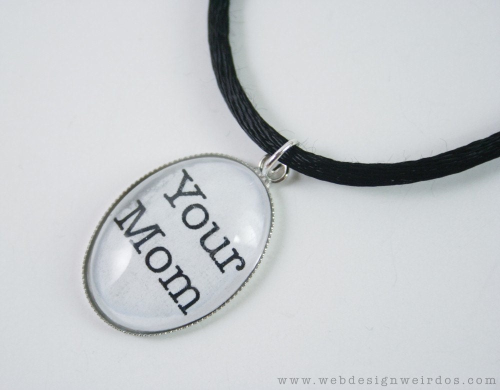 Your Mom Geek Necklace. Glass pendant with black satin cord with Your Mom text.