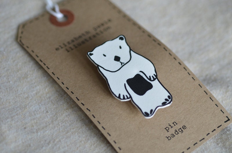 sea otter brooch - by elizabeth pawle - modern design - hand drawn hand cut - illustration pin badge