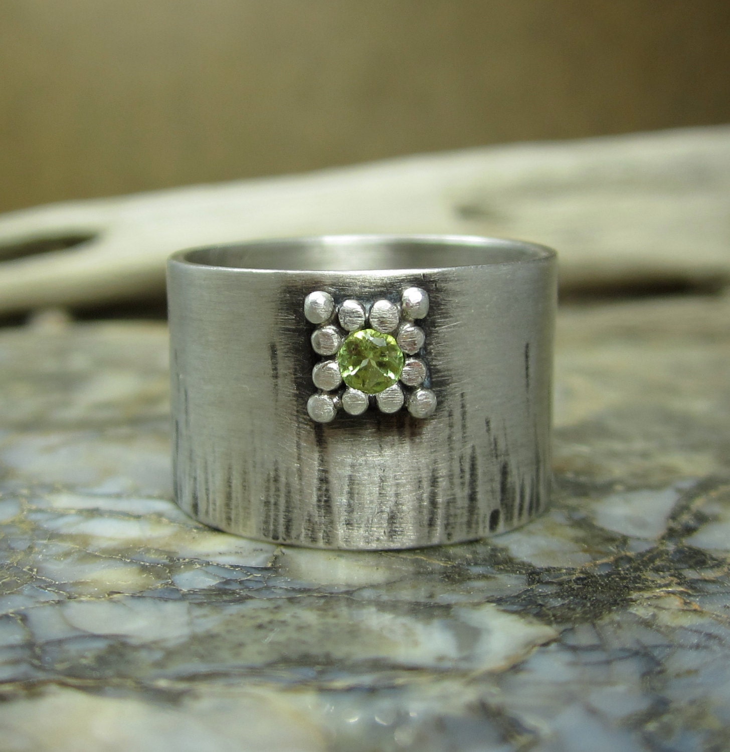 hammered sterling silver wide band with peridot