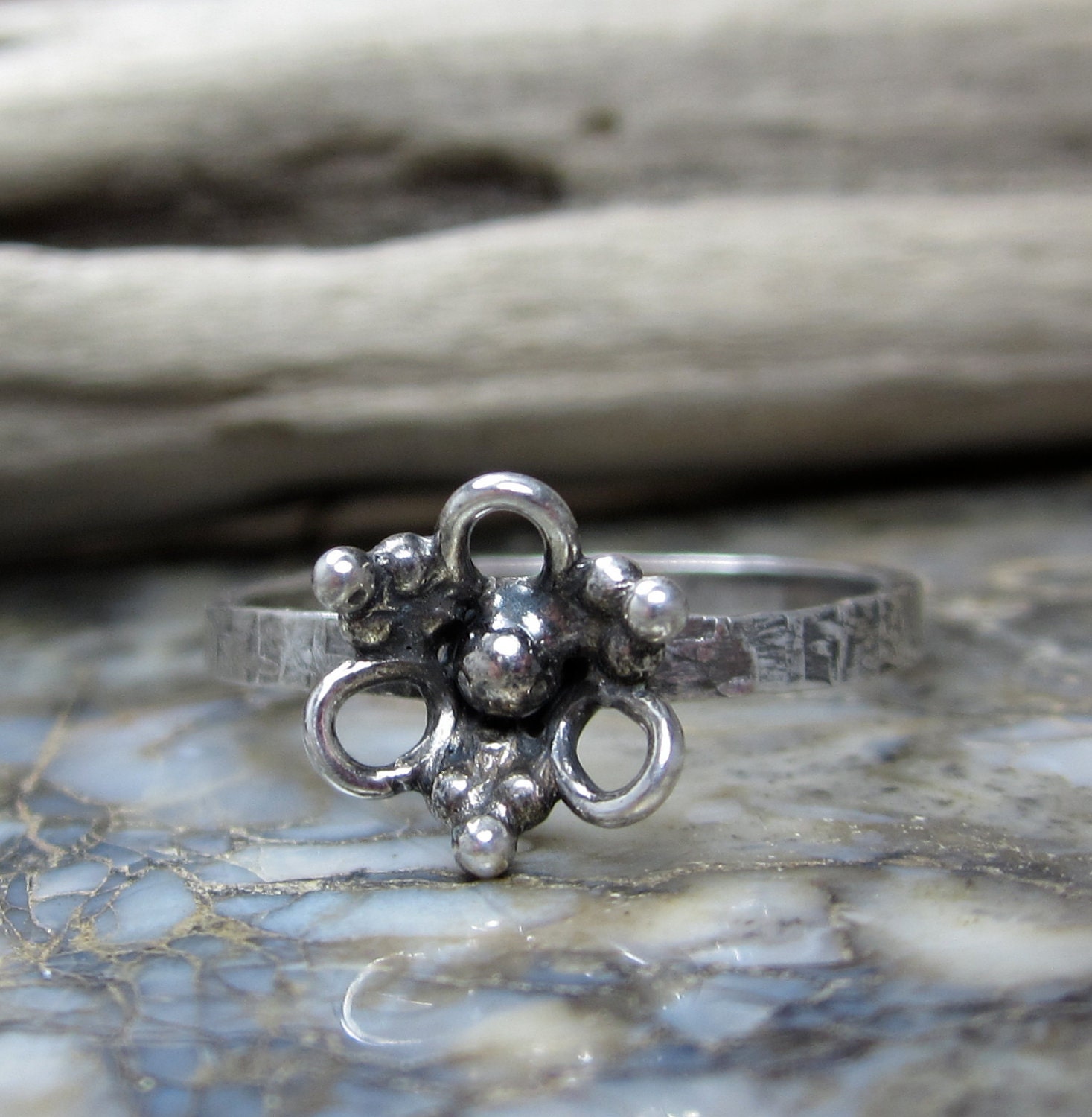 Sterling silver flower ring with hammered band size 8
