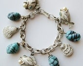 Vintage 50s 60s Chunky Gold White Washed Under the Sea Shells Fish Pearls Art Glass Novelty Lucky Charm Bracelet
