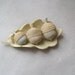 Hand sculpted acorns with a unique oak leaf bowl