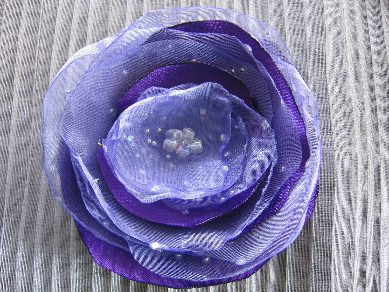 Bridal special occasion  fabric flower hair clip wedding accessory in purple and lavender sparkle