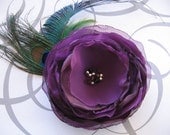 Aubergine purple fabric flower hair accessory or lapel pin peacock feathers