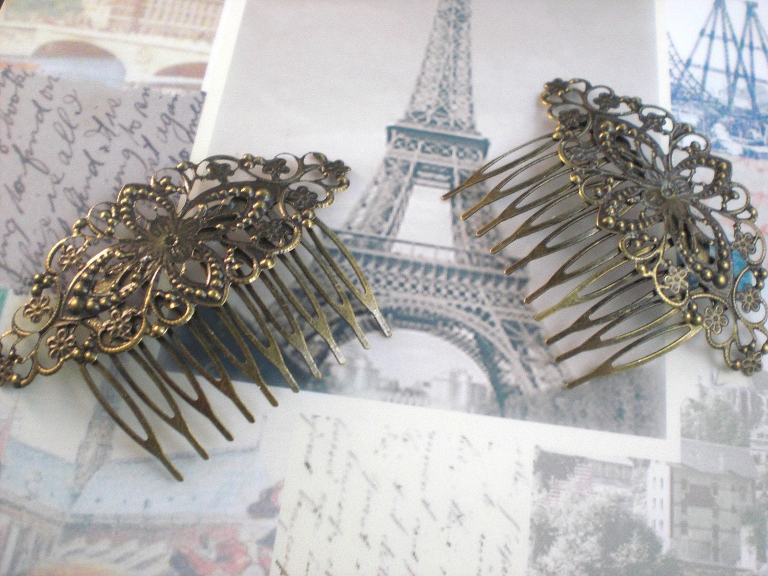 Pair of Antique Bronze Hair Combs (2)
