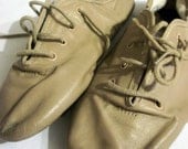 Vintage kids tan lace-up jazz shoes