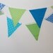 Blue and green fabric banner