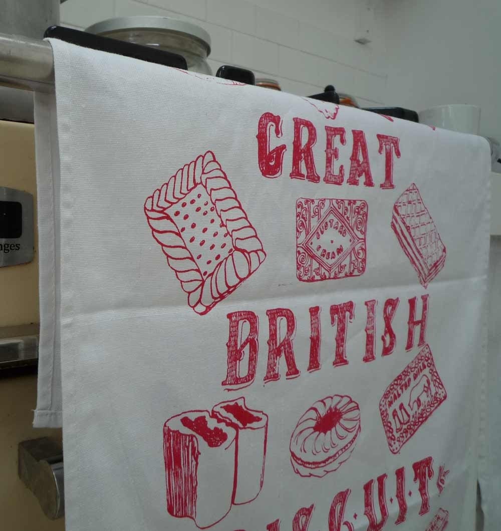 The Great British Biscuit Tea Towel - raspberry red