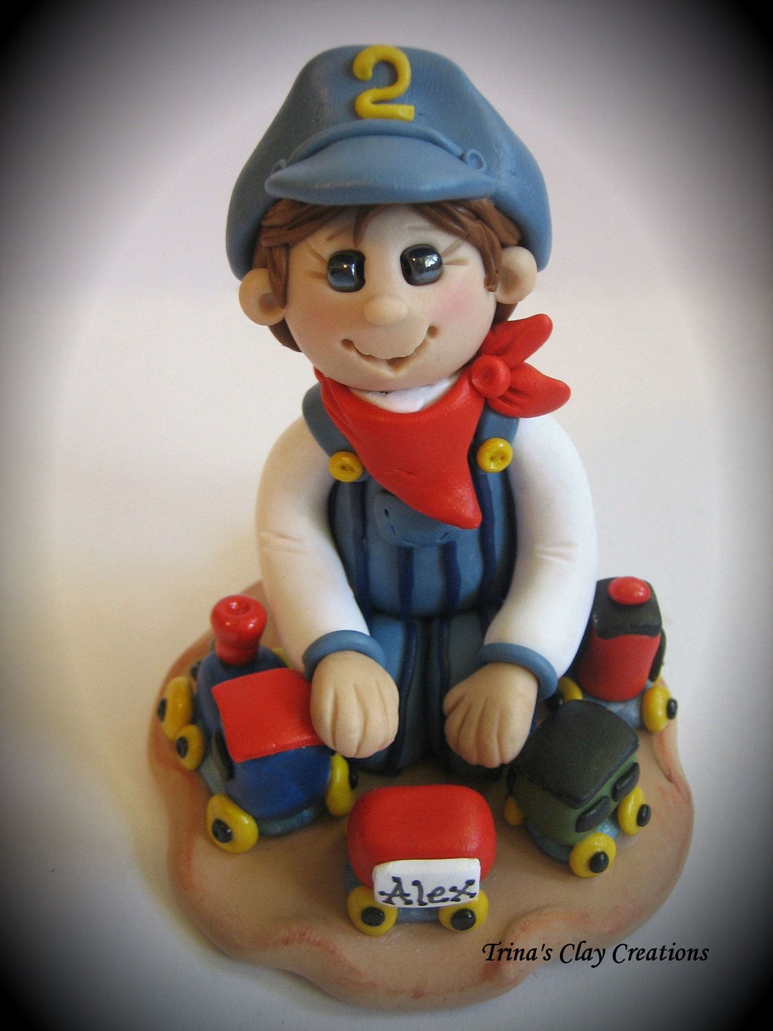Polymer Clay Train Conductor and Train Birthday Cake Topper - trinasclaycreations