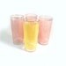 Pink and yellow drinking glasses by Federal - set of four