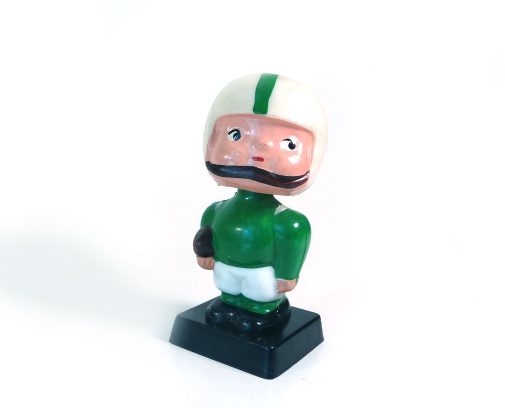 Vintage bobble head doll -high school football green white